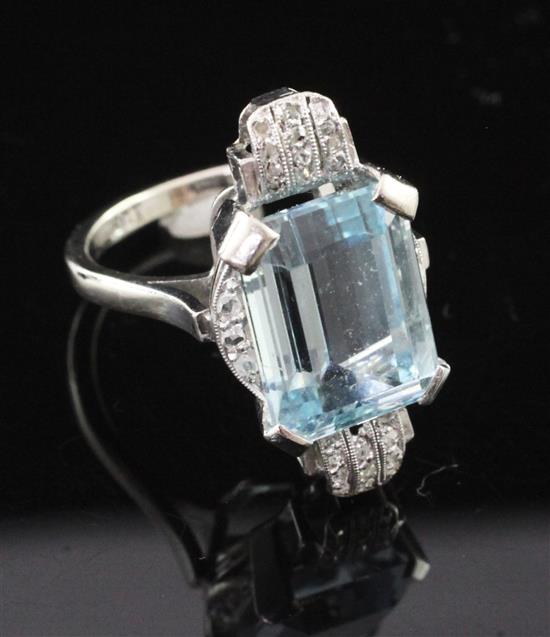 An Art Deco 18ct white gold aquamarine dress ring.